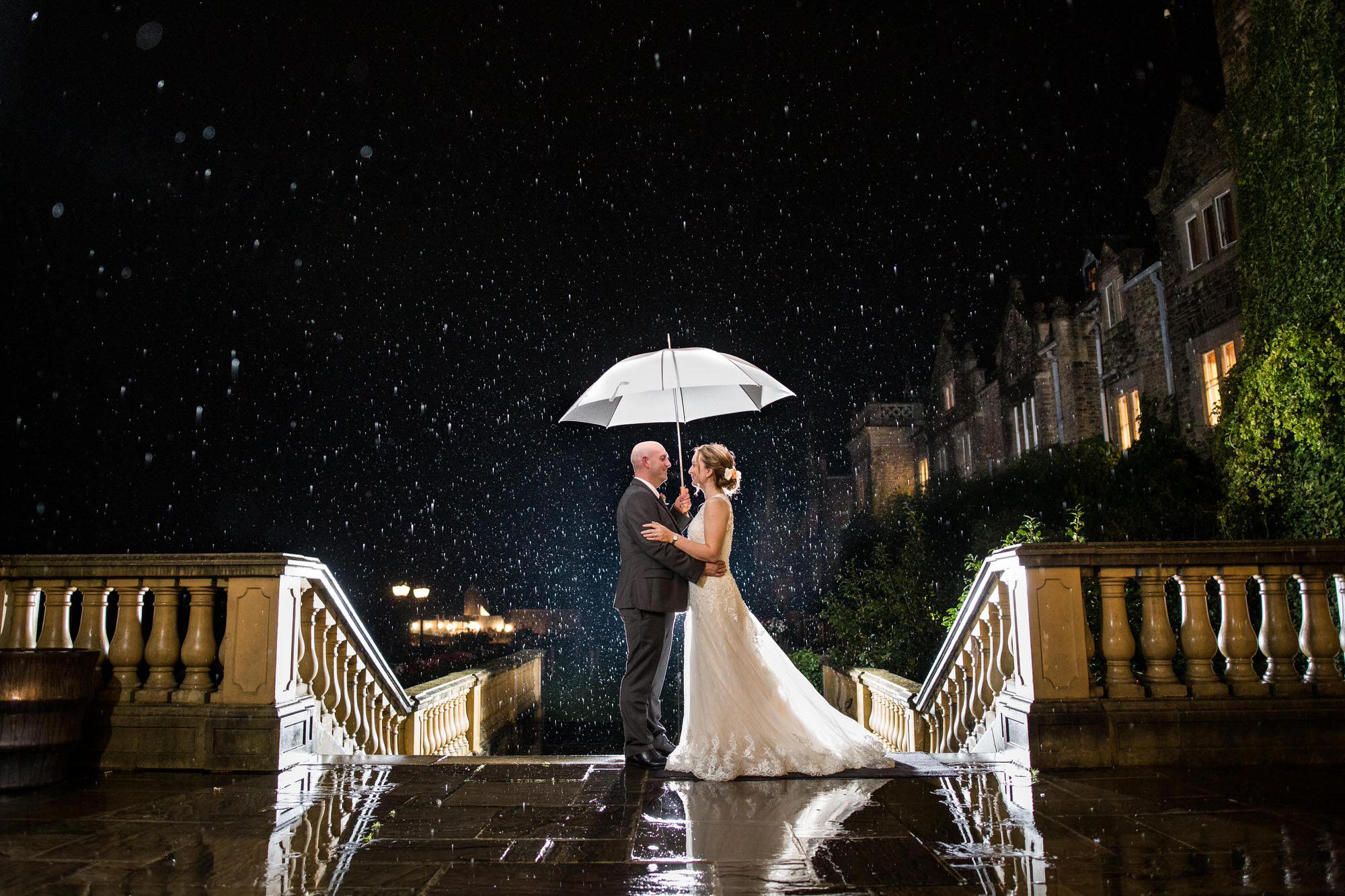 Professional Wedding Photograph in the rain at South Lodge Hotel in Horsham
