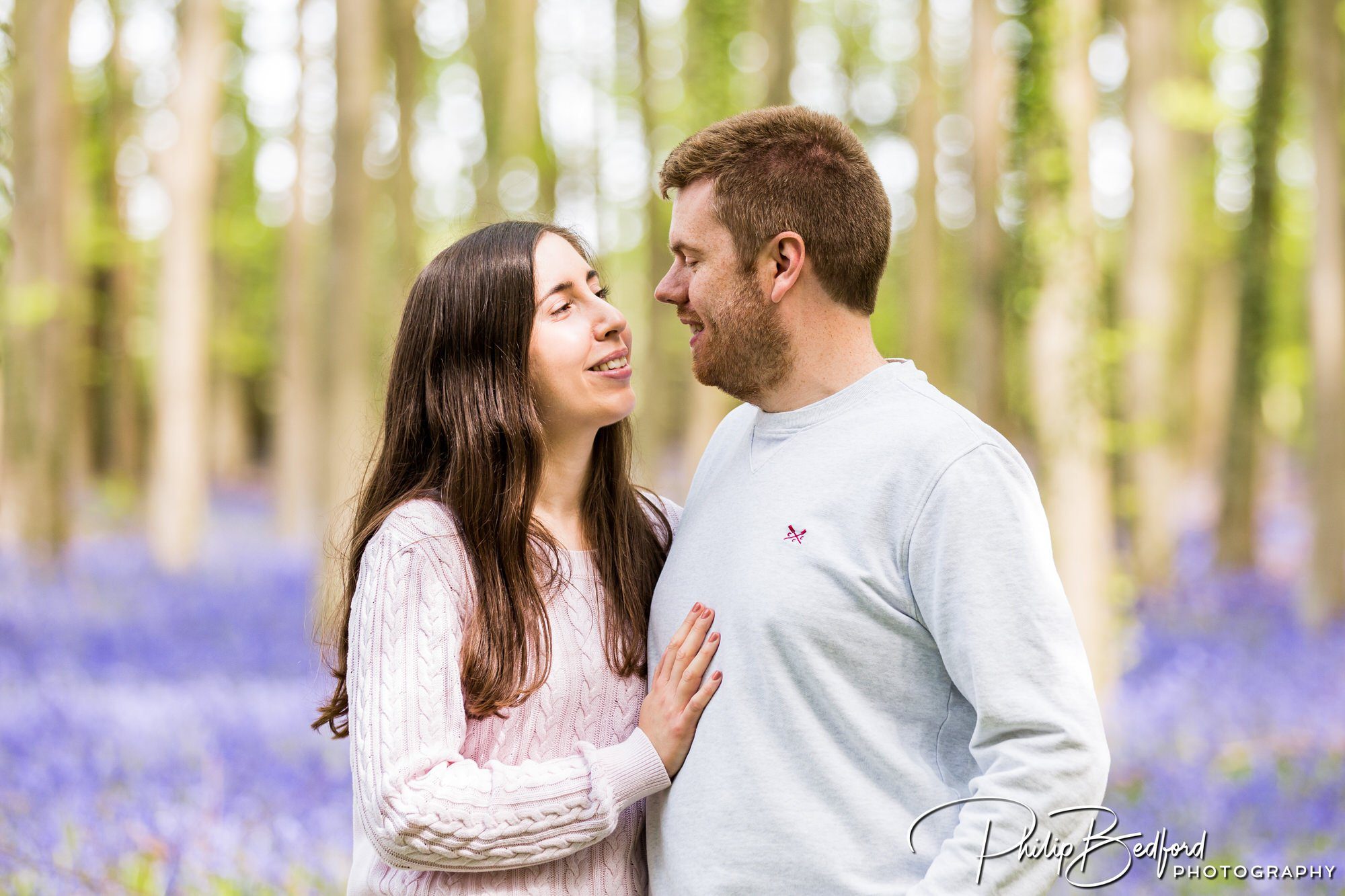 Man & Woman amongst Bluebells on a Engagement Shoot near Worthing, West Sussex